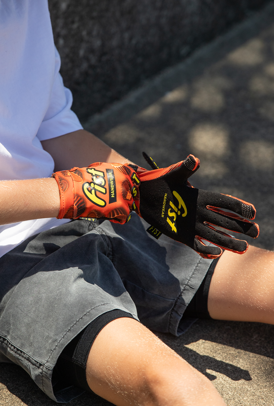 Youth Strapped 100% Nuts Gloves (Ages 8-14)