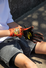 Youth Strapped 100% Nuts Gloves (Ages 8-14)